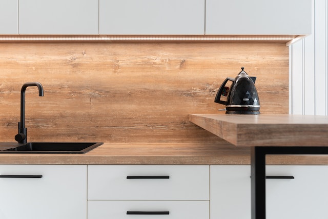 Wooden kitchen cabinets showing different types of wood